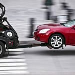 can a tow company keep my car